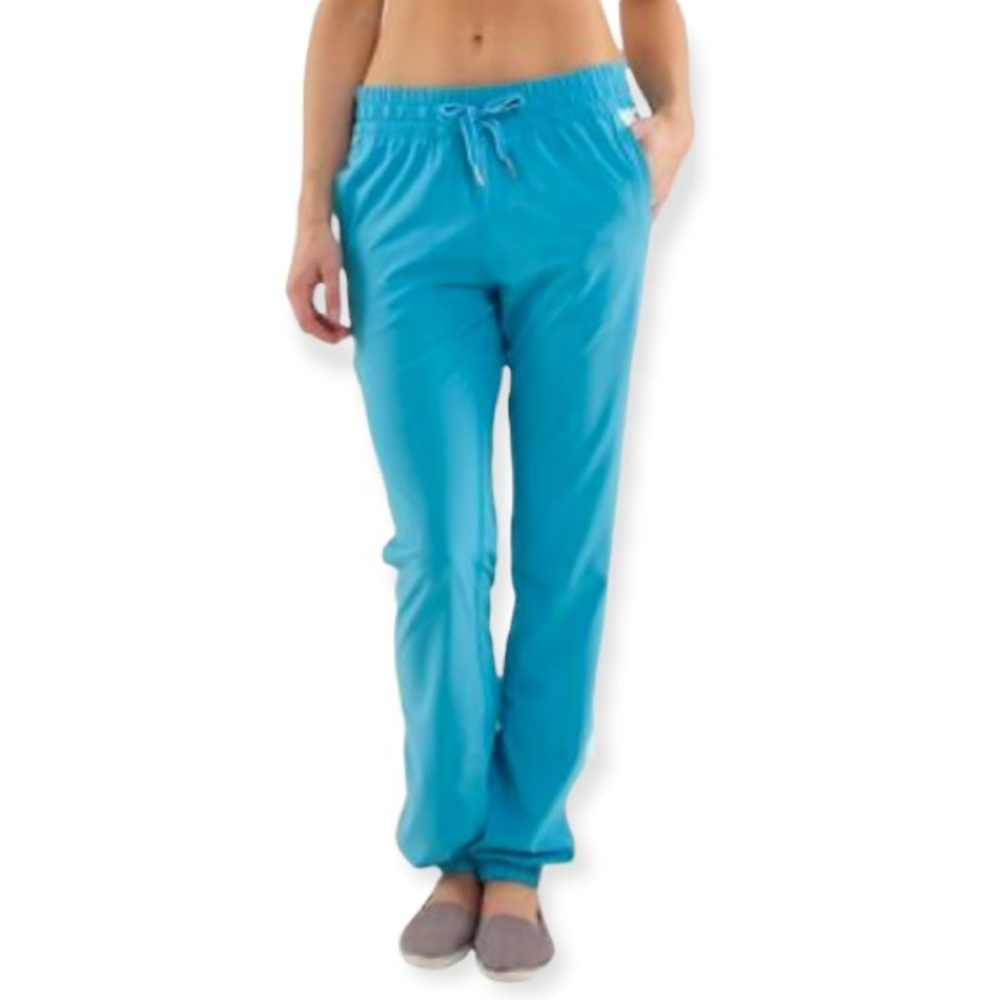Lululemo kayak track pants blue aquamarine and white stripeds on the sides L8-29